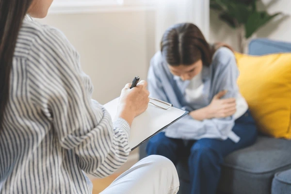 Patient discussing emotions with therapist during DBT session